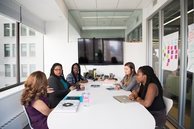 group-of-women-gathered-inside-conference-room